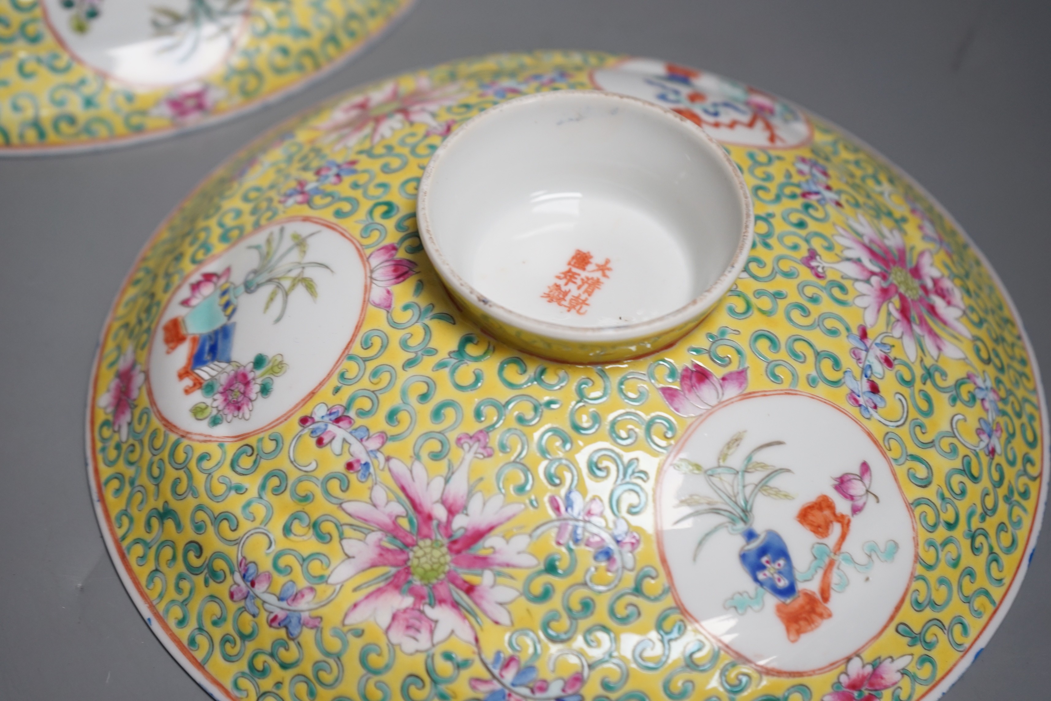 A large Chinese famille rose yellow ground bowl and cover, Republic period, 25cm diameter